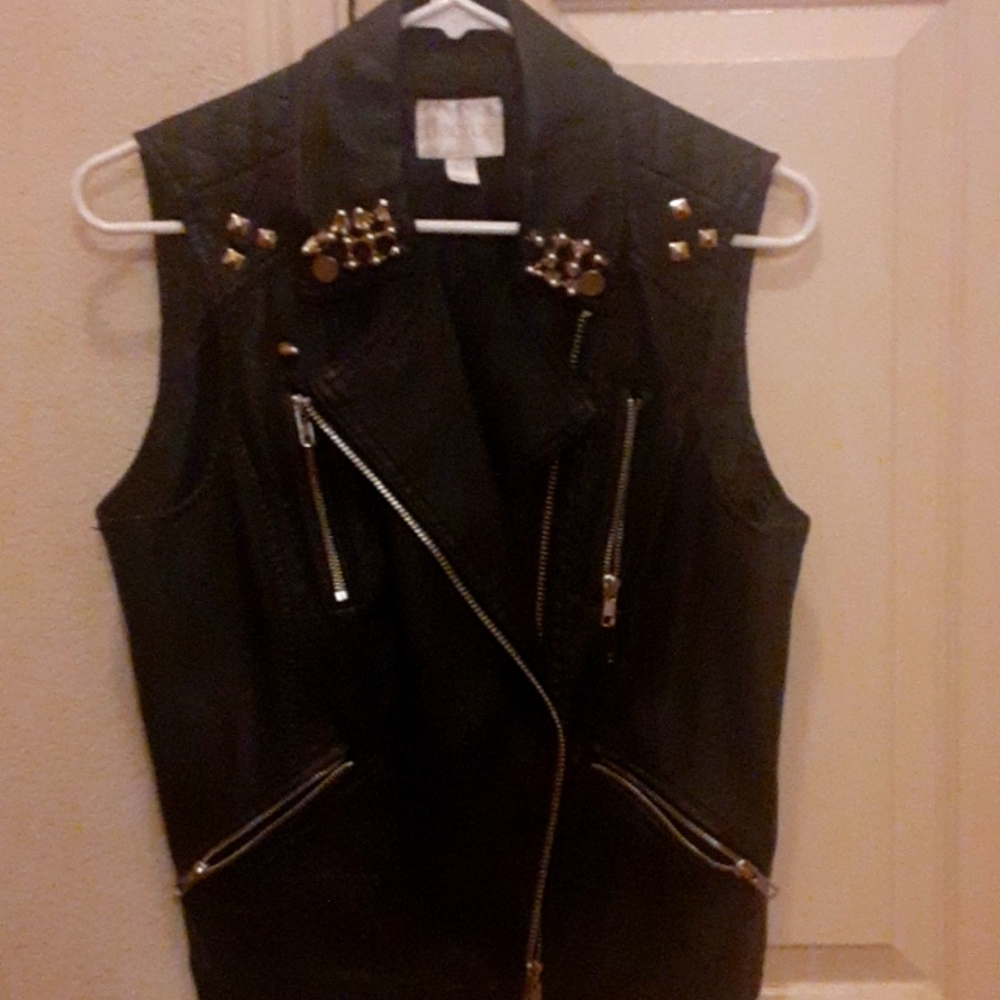 Studded Medium Faux leather vest. Work once